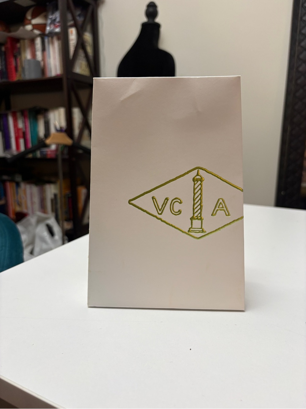 Van Cleef & Arpels White bag with Gold Logo Accent